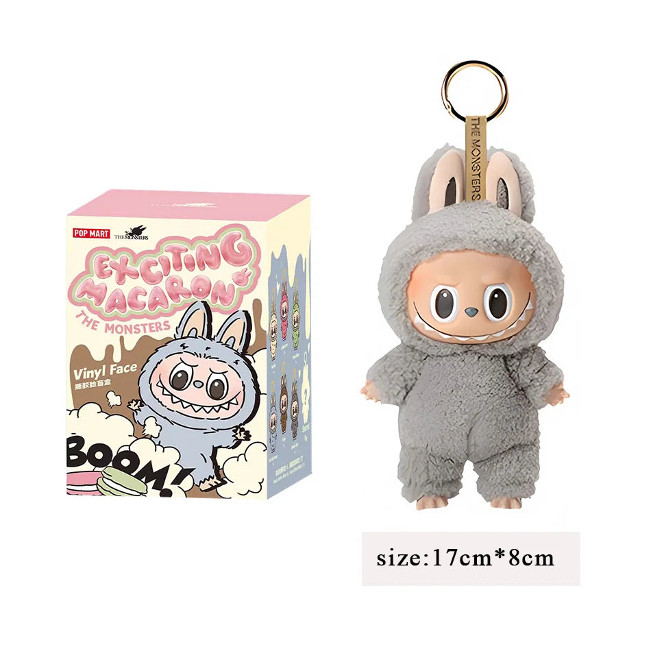 2025 New Stock figura de Anime caliente Labubu tiene un asiento serie PVC colgante muñeca modelo monstruo réplica llavero chico j