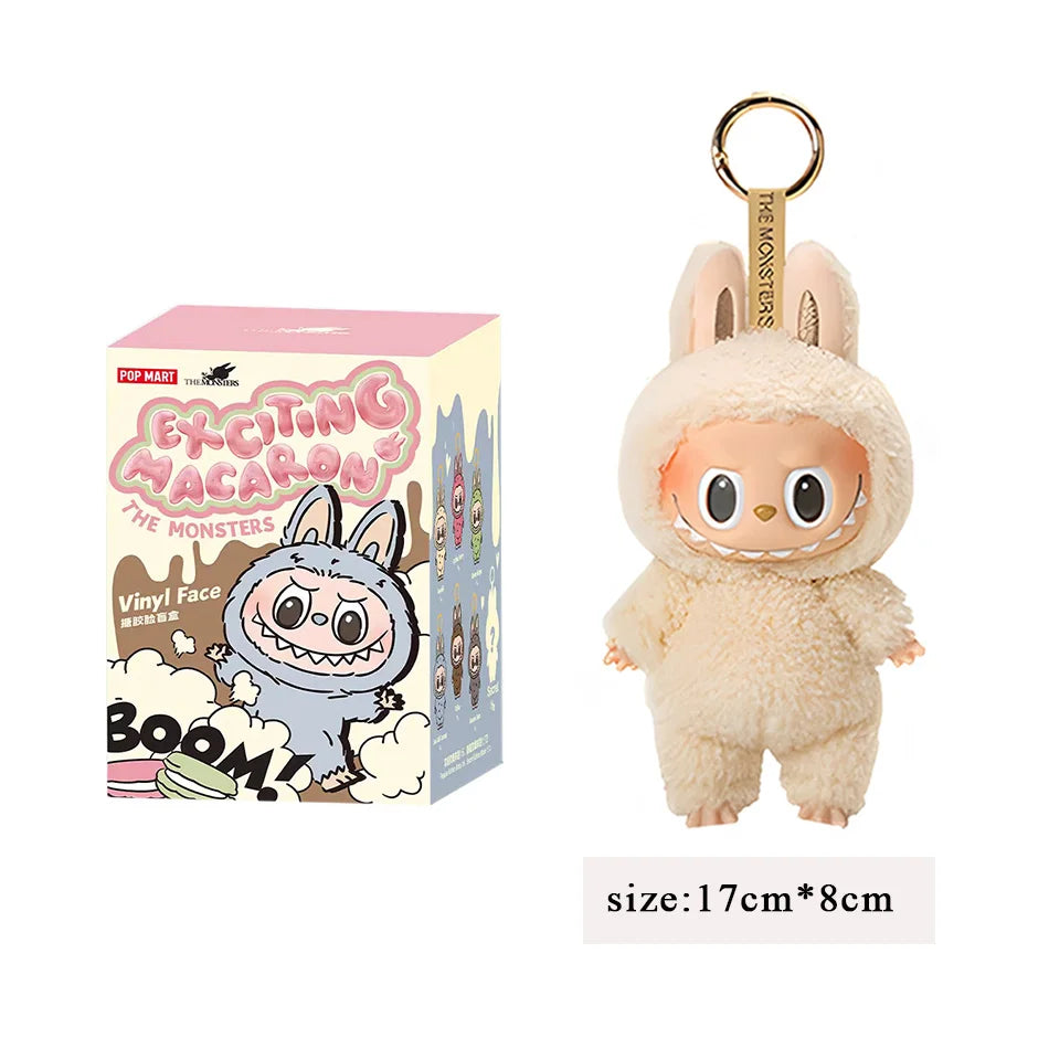 2025 New Stock figura de Anime caliente Labubu tiene un asiento serie PVC colgante muñeca modelo monstruo réplica llavero chico j