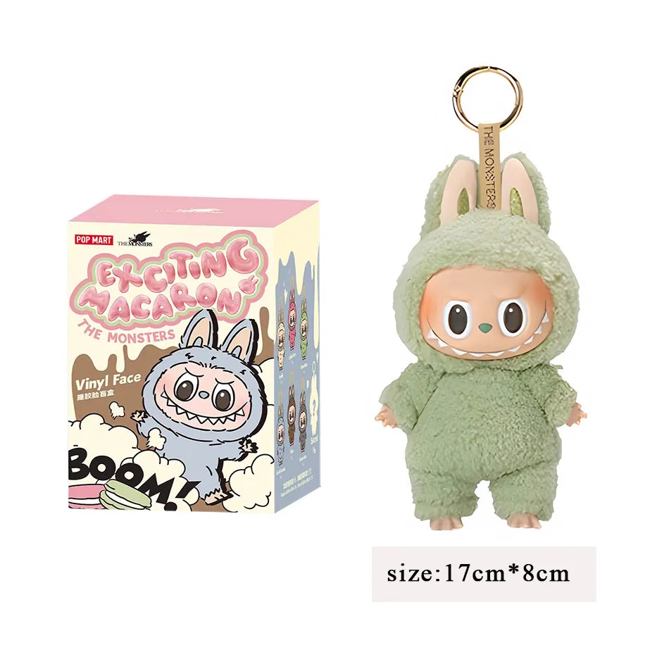 2025 New Stock figura de Anime caliente Labubu tiene un asiento serie PVC colgante muñeca modelo monstruo réplica llavero chico j