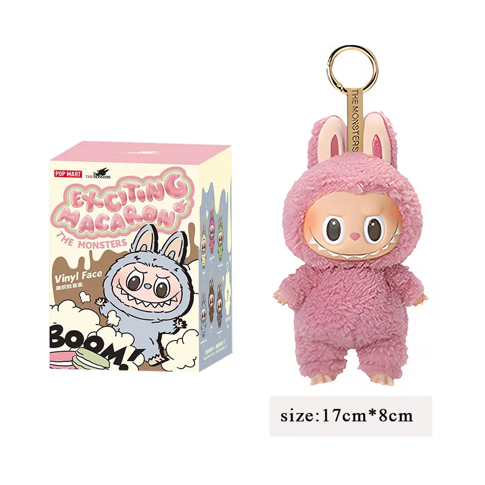 2025 New Stock figura de Anime caliente Labubu tiene un asiento serie PVC colgante muñeca modelo monstruo réplica llavero chico j